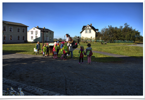 Children gather for the tour of the "homes museum" of Iceland.